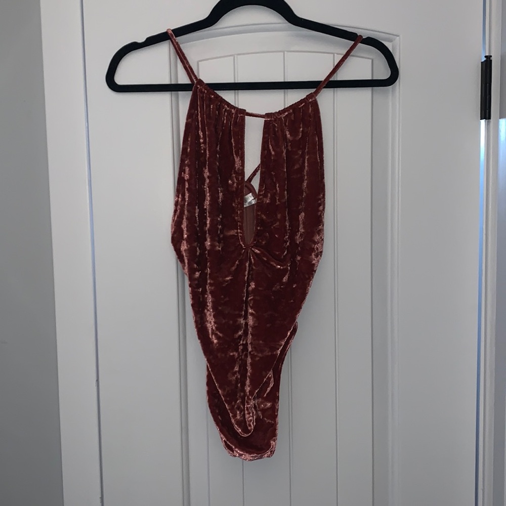 Pink velour bodysuit